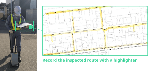 Inspected routes are marked using a pen as needed while walking.